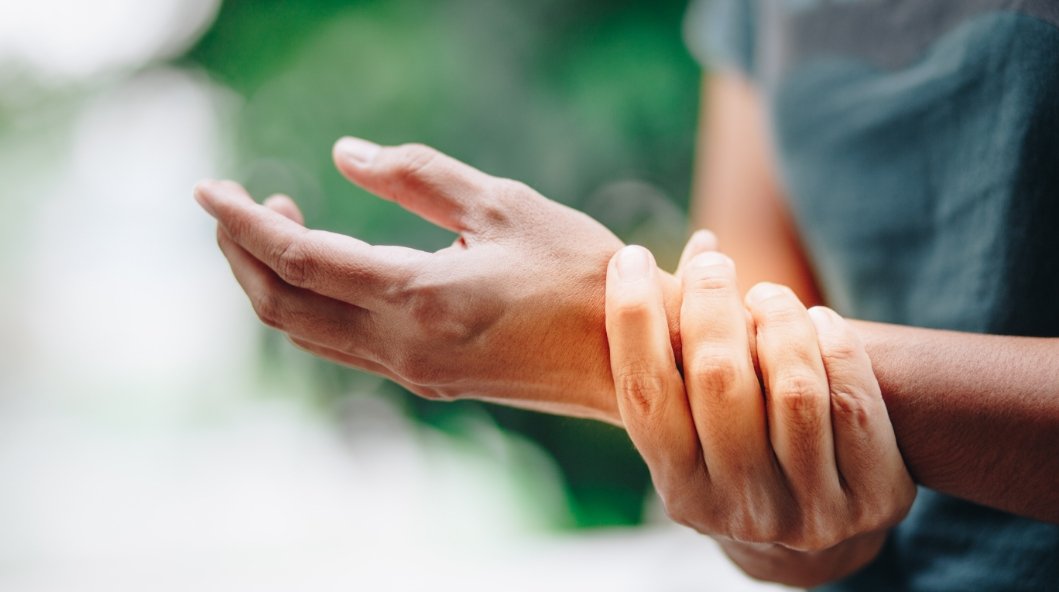 hand holding wrist